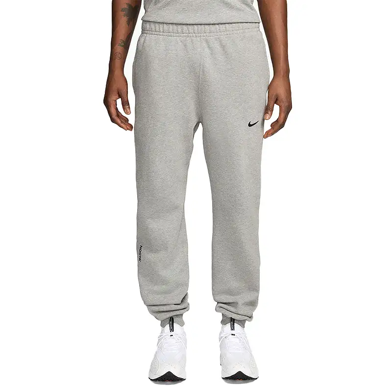 NIKE X NOCTA NRG FLEECE PANTS HEATHER GREY FN7661-063